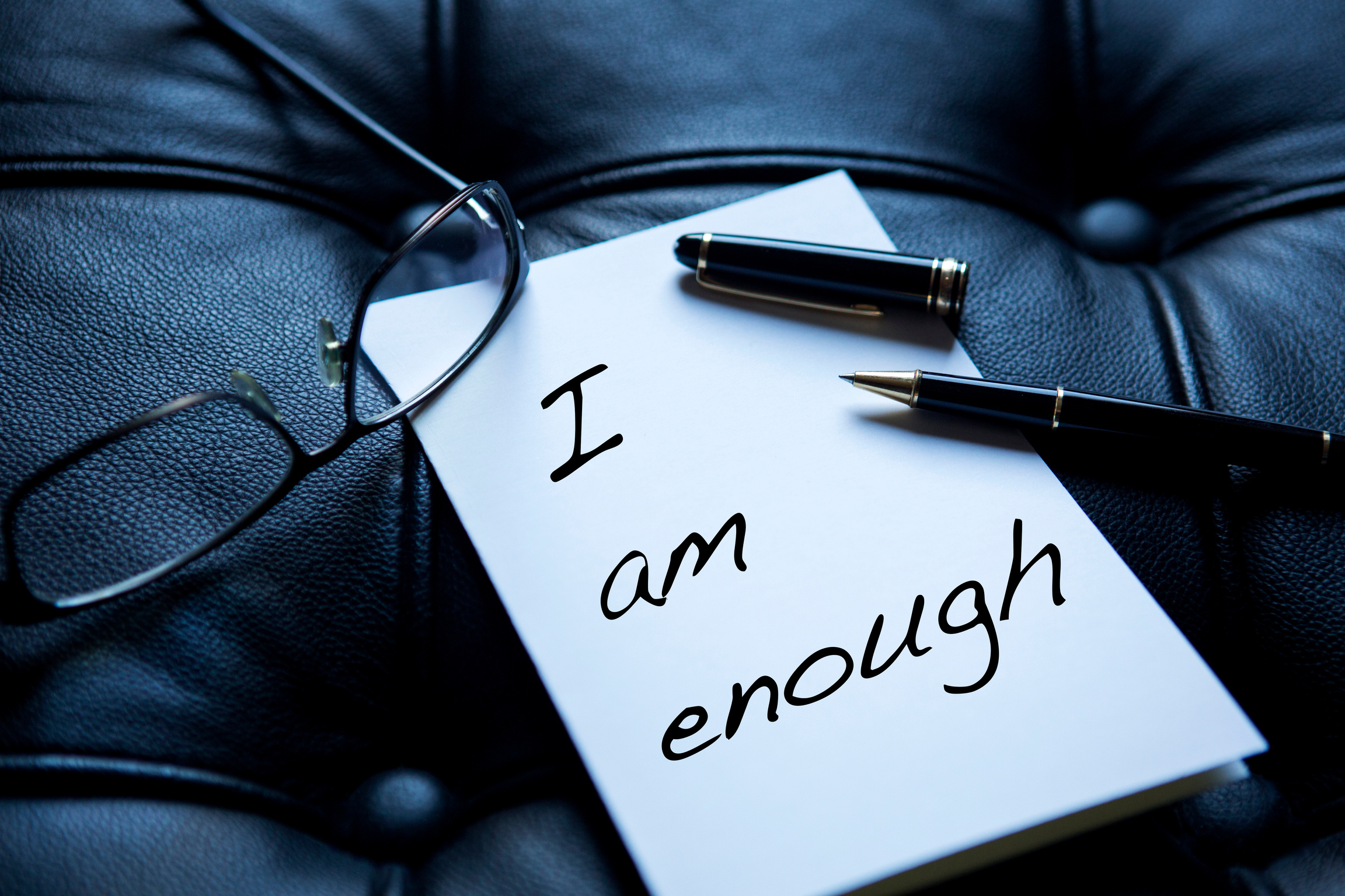 I Am Enough written on paper